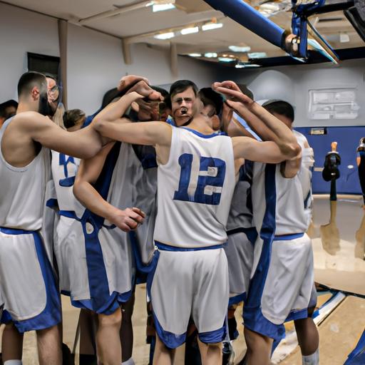 The Hillsdale Men's Basketball team rejoicing after a well-deserved win.