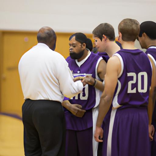 Albion Men's Basketball coach providing guidance and motivation to the team.