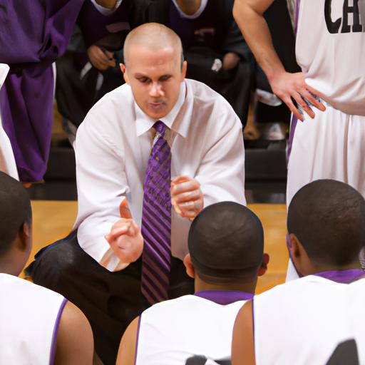 Capital Men's Basketball coach providing strategic instructions to the team during a timeout.