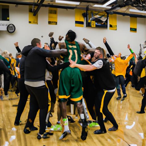 The joyous celebration of the Tiffin University Men's Basketball team after a hard-fought win, epitomizing their resilience and teamwork.