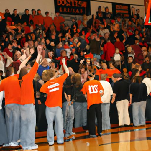 Fans show their support as the Wartburg Men's Basketball team dominates the court.
